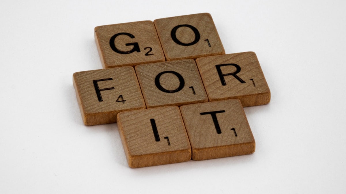 scrabble, scrabble pieces, lettering, letters, wood, scrabble tiles, white background, words, quote, letters, type, typography, design, layout, focus, bokeh, blur, photography, images, image, go for it, try, attempt, do something, do your best, impulse, self starter, first step, motivation,